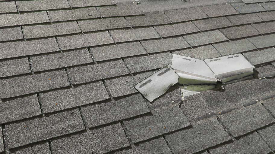 roof missing shingles - Signs You Need a Roof Replacement